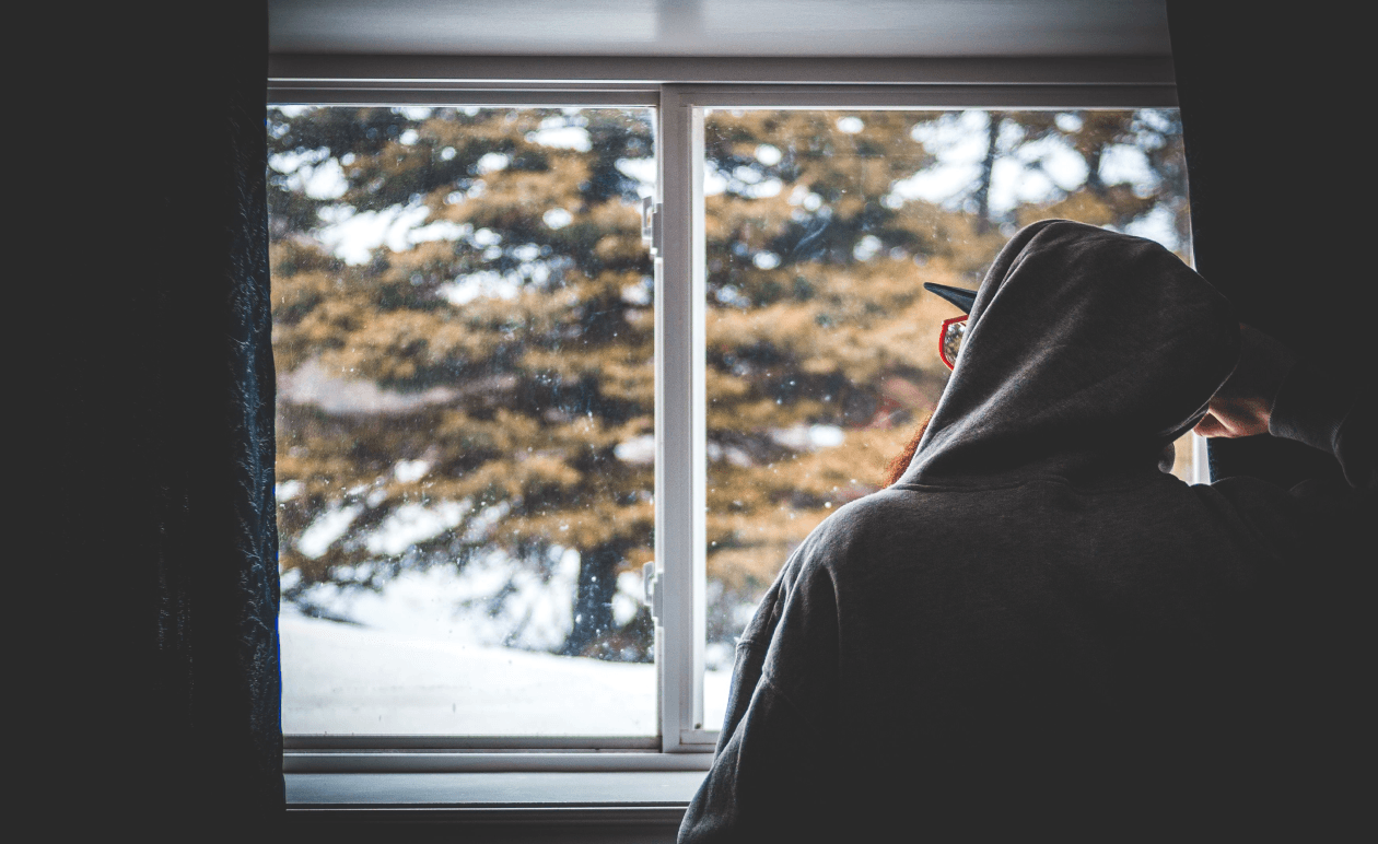 A person looking out of the window.