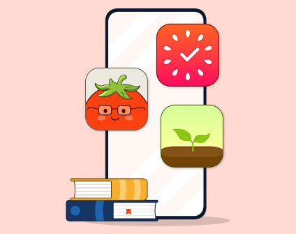 Pomodoro timer standing on books